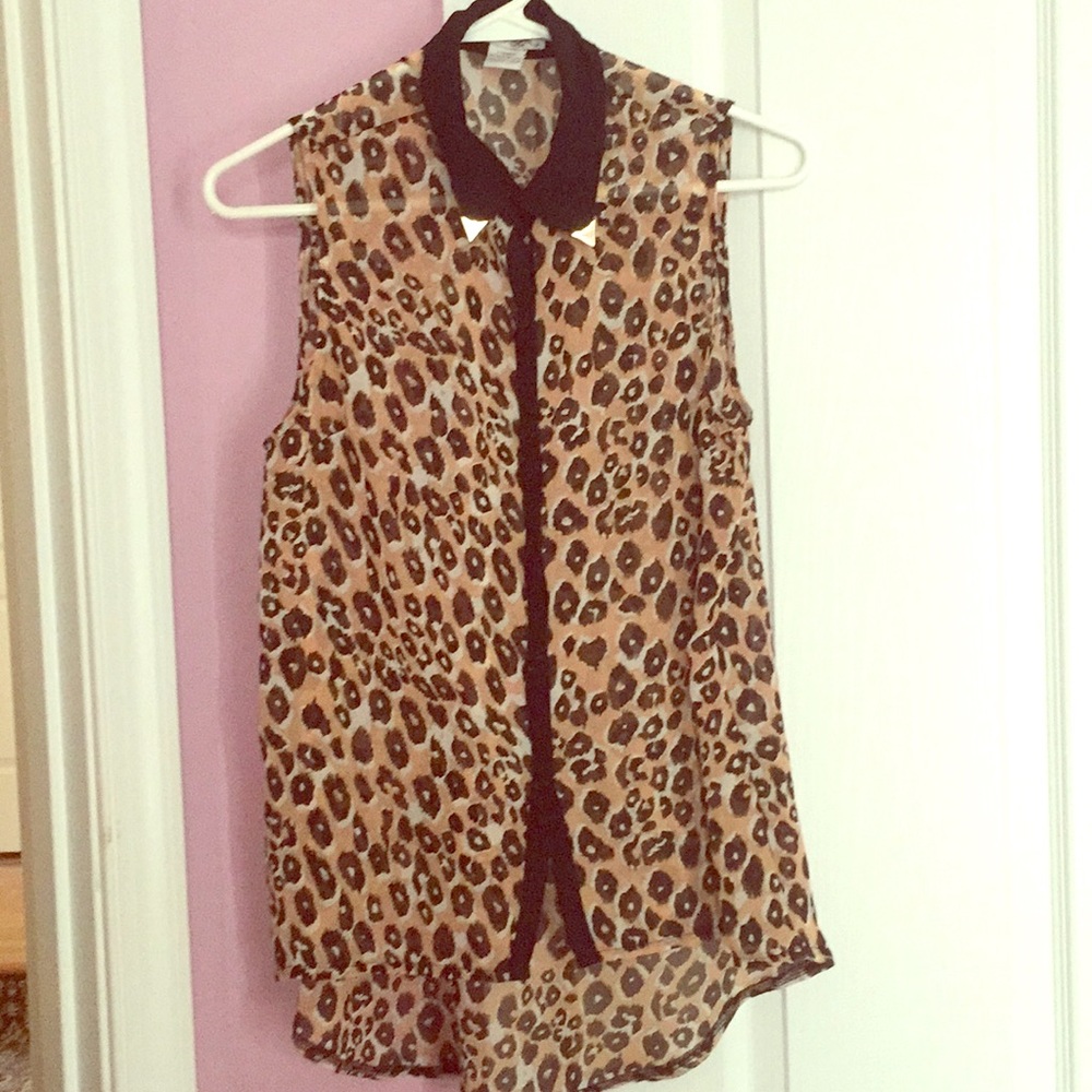 Cheetah print, chiffon, sleeveless button up.